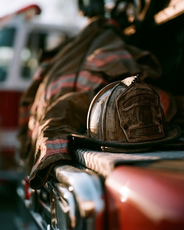 First responder helmet and gear on a fire truck